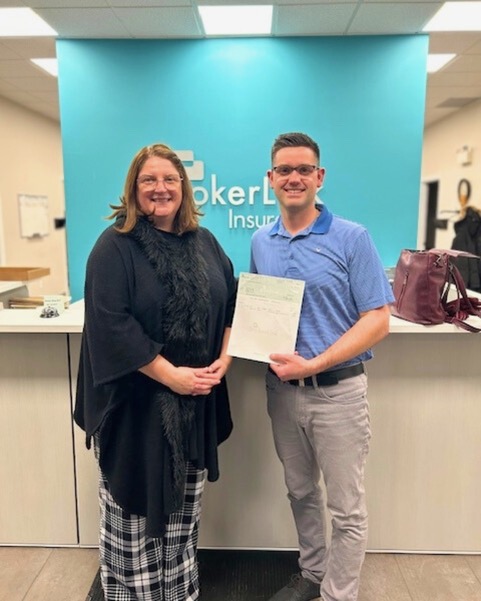 COH cheque presentation to Elaine Jackman